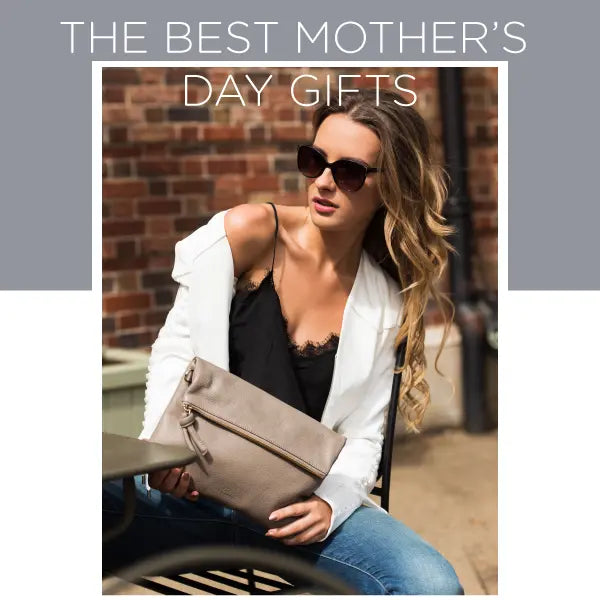 young women with esin akan hand bag